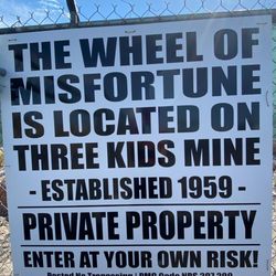 Wheel of Misfortune - Signage