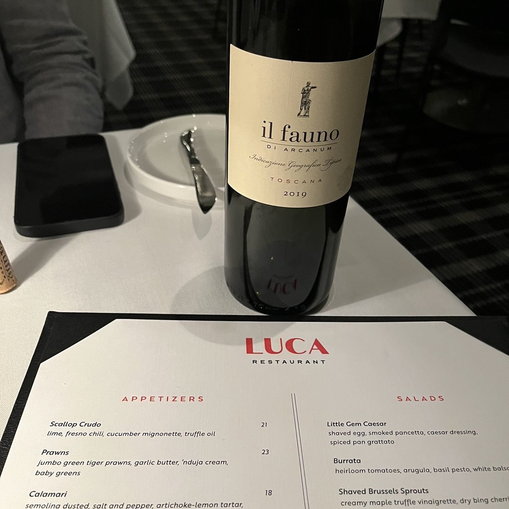 Luca Restaurant - a bottle of wine on a table - Italian Near Me - Calgary, Alberta Luca Restaurant - a bottle of wine on a table - Italian Near Me - Calgary, Alberta