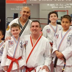 Empower Martial Arts - Some of our soon to be Black Belts and Master Beisel.