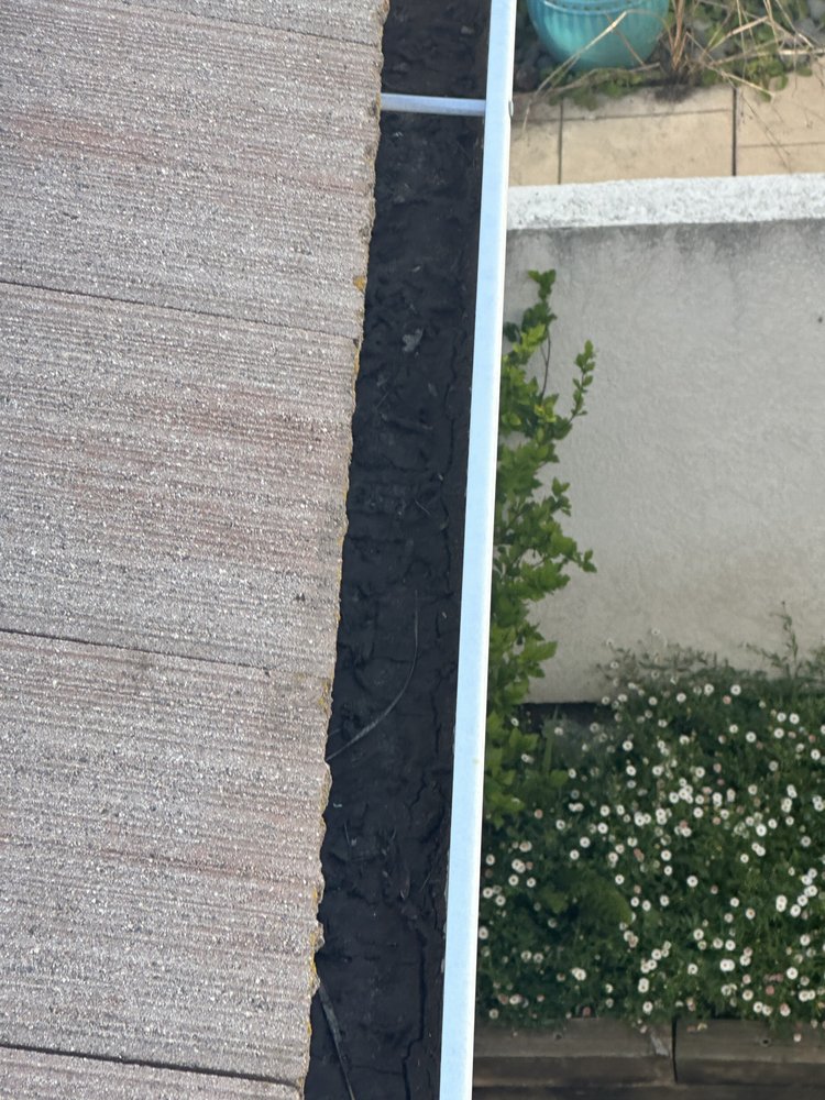 Slide of Aloha Bros Roof Cleaning