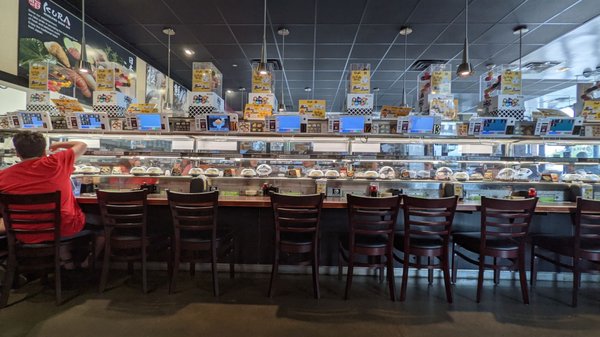 Kura Revolving Sushi Bar by null