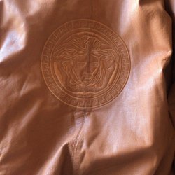 Value Village - $5 bomber jacket! With the big Versace Medusa