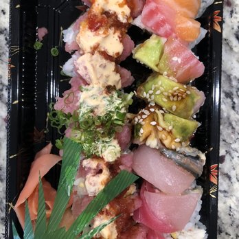 Yojimbo - Summer Roll (left) and Rainbow Roll (right). - Sushi Bars Near Me - Alameda, California Yojimbo - Summer Roll (left) and Rainbow Roll (right). - Sushi Bars Near Me - Alameda, California