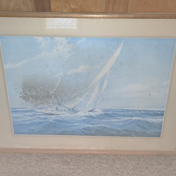 Stan White Realty - Mold BEHIND THE GLASS of a picture hanging in the family room - Vacation Rental Agents Near Me - Nags Head, North Carolina