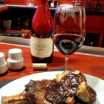 Fleming’s - Belade Pinot Noir with Bone-in Ribeye topped with Pork Belly - Steakhouses Near Me - Orlando, Florida Fleming’s - Belade Pinot Noir with Bone-in Ribeye topped with Pork Belly - Steakhouses Near Me - Orlando, Florida