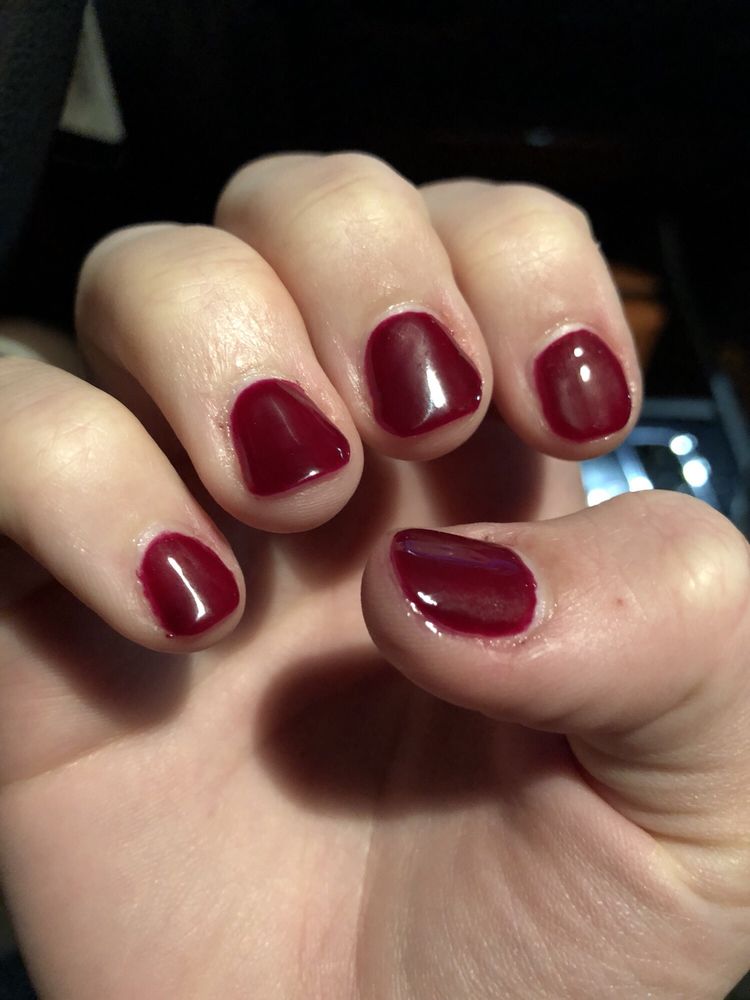 Extreme Nails and Tanning Logo