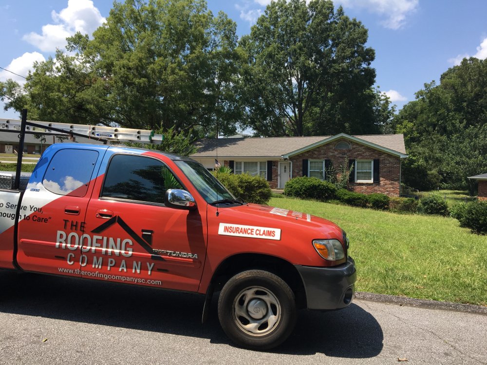 Slide of The Roofing Company