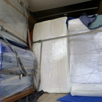 CH Professional Movers - Loading a truck - Movers Near Me