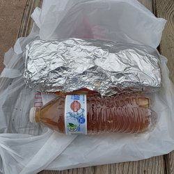 Uncle Vinny's Pizzeria & Ristorante - Comparison of size of sandwich next to a water bottle