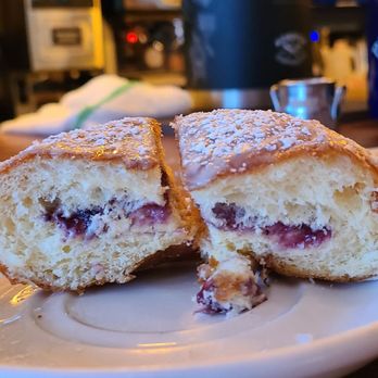 Blue Cafe - Cross section of Pączki at Blue Cafe. - Breakfast & Brunch Near Me - Basking Ridge, New Jersey Blue Cafe - Cross section of Pączki at Blue Cafe. - Breakfast & Brunch Near Me - Basking Ridge, New Jersey