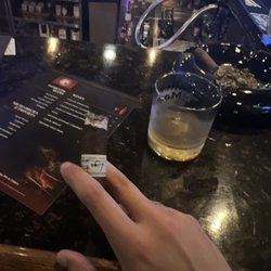 Skookum Creek Cigar Lounge - Bar seat. Liga Privada No.9. Eagle rare on ice. OpusX in the ashes.