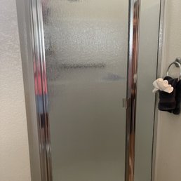 A custom cut shower door with 2023 touches to replace the warn out 25 year old door. A custom cut shower door with 2023 touches to replace the warn out 25 year old door.