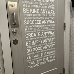 Roots Cafe Maine - Back of bathroom door