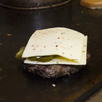 Nicky Rottens - Burger on their flattop. - Sports Bars Near Me - Coronado, California Nicky Rottens - Burger on their flattop. - Sports Bars Near Me - Coronado, California