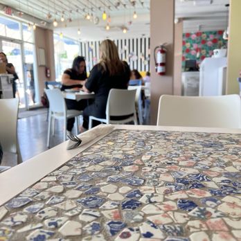 Mona - Interior - tables are all mosaic'd - Coffee & Tea Near Me - Aguadilla, Puerto Rico Mona - Interior - tables are all mosaic'd - Coffee & Tea Near Me - Aguadilla, Puerto Rico