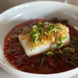 Icelandic Cod. Perfectly cooked with fresh garden tomato puree with nice clean tangy flavors.