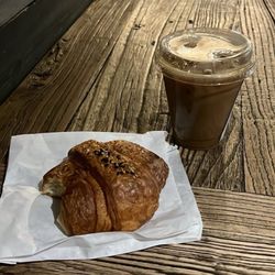 Ebenezers Coffeehouse - Iced coffee and ham and cheese croissant
