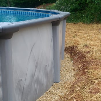 Turner's Pool and Spa Service - This is the side that they dumped the sand on the outside of the pool, you can see the one sections is sticking out further. - Pool Cleaners Near Me - Fredericksburg, Virginia Turner's Pool and Spa Service - This is the side that they dumped the sand on the outside of the pool, you can see the one sections is sticking out further. - Pool Cleaners Near Me - Fredericksburg, Virginia