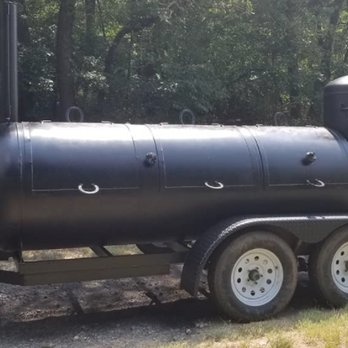 Up In Smoke Catering - a black smoker on a trailer - Food Trucks Near Me Up In Smoke Catering - a black smoker on a trailer - Food Trucks Near Me