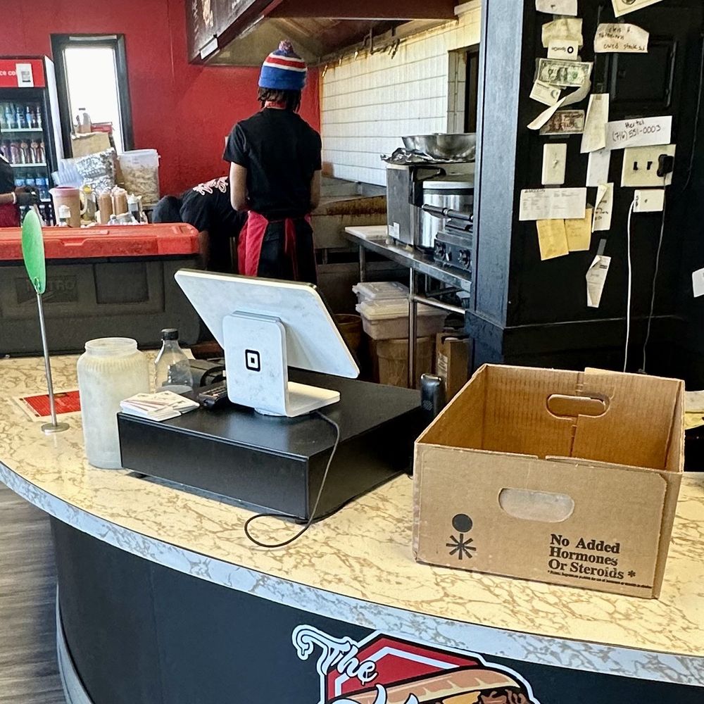 The Hoagie Stop - a man working behind a counter - Breakfast & Brunch Near Me - West Seneca, New York The Hoagie Stop - a man working behind a counter - Breakfast & Brunch Near Me - West Seneca, New York