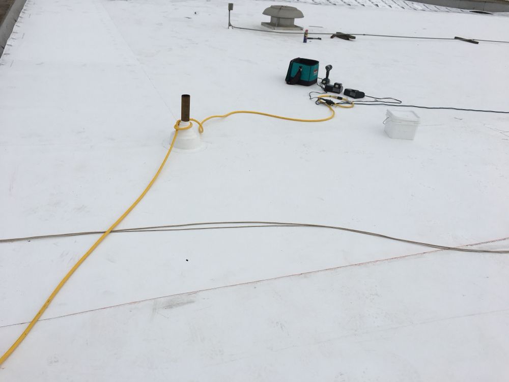 Slide of Espino Roofing