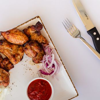 Mama Mia Pizza - chicken thigh 1 pound serve with hot fresh bread - Pizza Near Me - Sacramento, California Mama Mia Pizza - chicken thigh 1 pound serve with hot fresh bread - Pizza Near Me - Sacramento, California
