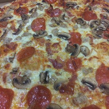 Miley E's Pizza - a pepperoni and mushroom pizza - Pizza Near Me - Granville, New York Miley E's Pizza - a pepperoni and mushroom pizza - Pizza Near Me - Granville, New York