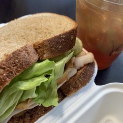 The Spoon & Fork - Club sandwich on wheat with Sweet Tea to drink.