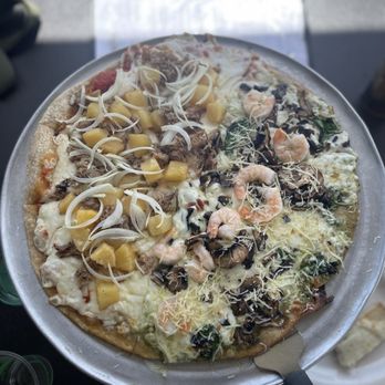 Manoli's Pizza Company - 1/2 Hawaiian Honey and 1/2 Shrimp Pesto - Pizza Near Me - Wailea, Hawaii Manoli's Pizza Company - 1/2 Hawaiian Honey and 1/2 Shrimp Pesto - Pizza Near Me - Wailea, Hawaii