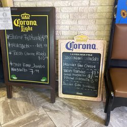 Family traditions saloon - Good margaritas. Ad boards should be written by people who know how to spell correctly...