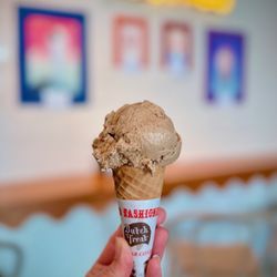 Moo Moo Mia - Scoop of the special August flavor Cookie Butter on a kids waffle cone - SO GOOD!