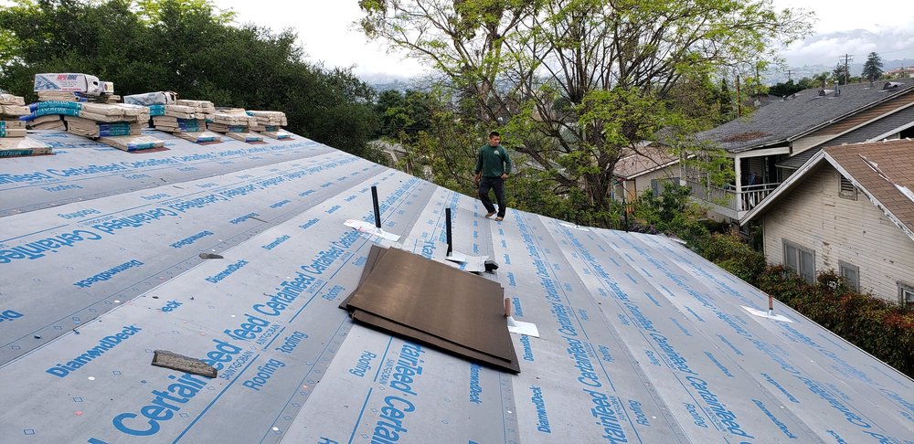 Slide of Al's Roofing & Gutters