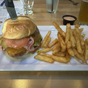 Tailgaters Bar & Grill - Big Kahuna burger with crispy chicken as the protein - Sports Bars Near Me - Selah, Washington Tailgaters Bar & Grill - Big Kahuna burger with crispy chicken as the protein - Sports Bars Near Me - Selah, Washington