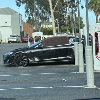 Tesla Supercharger - Cypress - What's the deal with this busted model S? - EV Charging Stations Near Me - Cypress, California Tesla Supercharger - Cypress - What's the deal with this busted model S? - EV Charging Stations Near Me - Cypress, California