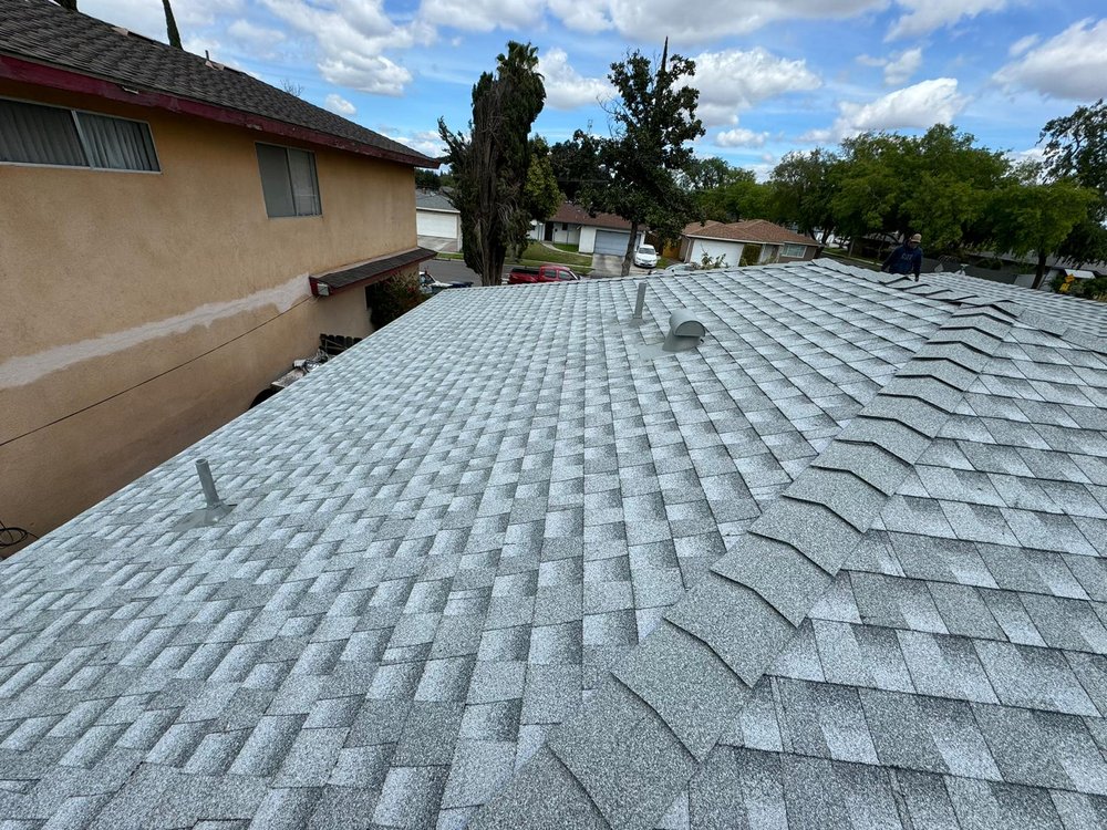 Slide of TAAG Roofing