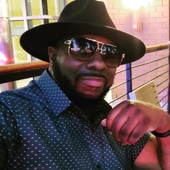 Bamboo Bar - a man wearing a hat and sunglasses - Bars Near Me - Philadelphia, Pennsylvania