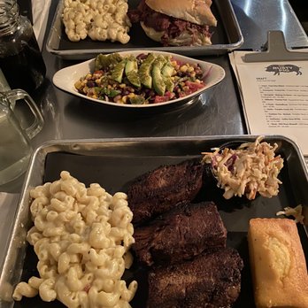 The Rusty Pig - Pastrami sandwich and the short ribs with Texas caviar in the center - Barbeque Near Me - Geneva, New York