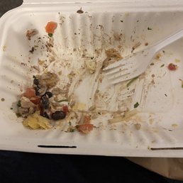 The aftermath of the 2 chicken tacos, and rice n beans. The aftermath of the 2 chicken tacos, and rice n beans.
