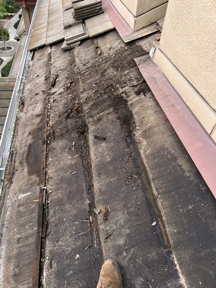 Slide of Roofing Service’s