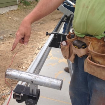 Habitat For Humanity - a man with a tool belt holding a metal pipe - General Contractors Near Me - Fort Worth, Texas Habitat For Humanity - a man with a tool belt holding a metal pipe - General Contractors Near Me - Fort Worth, Texas
