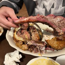 The 1/2 Pork Ribs & Beef Brisket plus a rib from another plate. The 1/2 Pork Ribs & Beef Brisket plus a rib from another plate.