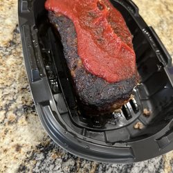 Safeway - Old burnt meatloaf. Put some more ketchup on it and nobody will notice.