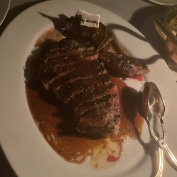 Maple & Ash - 22 oz. 28 Day Dry-Aged Bone-In Ribeye with Beefed Up Butter - Steakhouses Near Me - Chicago, Illinois Maple & Ash - 22 oz. 28 Day Dry-Aged Bone-In Ribeye with Beefed Up Butter - Steakhouses Near Me - Chicago, Illinois