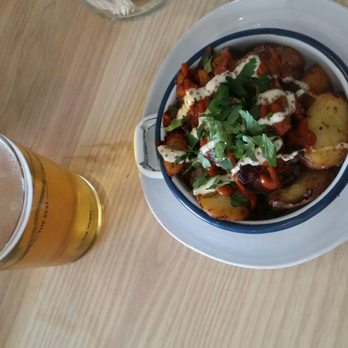 Wursthall - currywurst potatoes were crispy, meaty and tasty...good unique beer selection - German Near Me - San Mateo, California