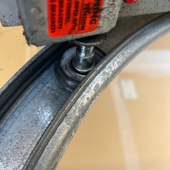 Local Garage Doors - New roller wheel one of 10 wheels. - Garage Door Services Near Me