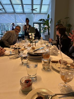 Photo of The Palmetto Cafe - Charleston, SC, US. Our table after being neglected. Finally got a different server to come and clear plates. This was before the huge ruckus and near melee.