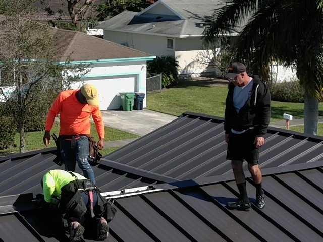 Slide of TNT Roofing