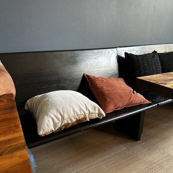 Yeiboh Kitchen - Pew seating at the table - New American Near Me - Baltimore, Maryland