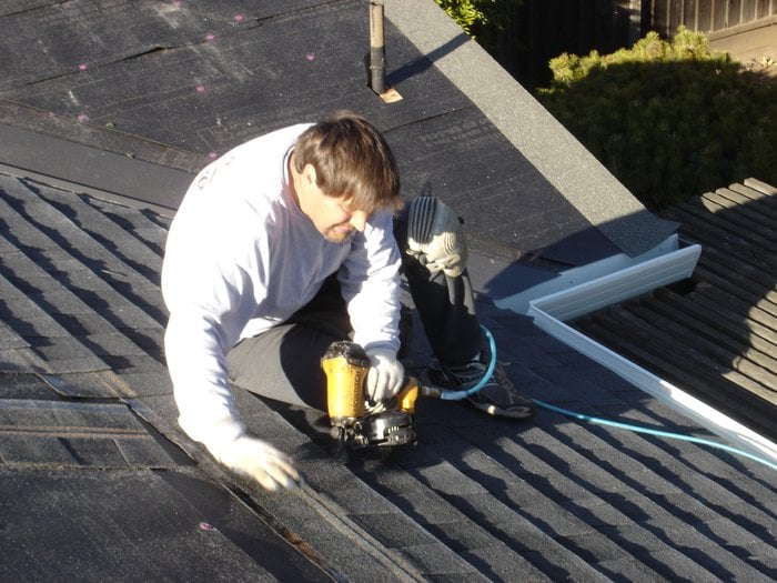 Slide of TNT Roofing