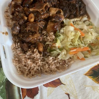 Hazel's Caribbean Restaurants - Oxtails rice and peas and cabbage - Caribbean Near Me - Melbourne, Florida Hazel's Caribbean Restaurants - Oxtails rice and peas and cabbage - Caribbean Near Me - Melbourne, Florida